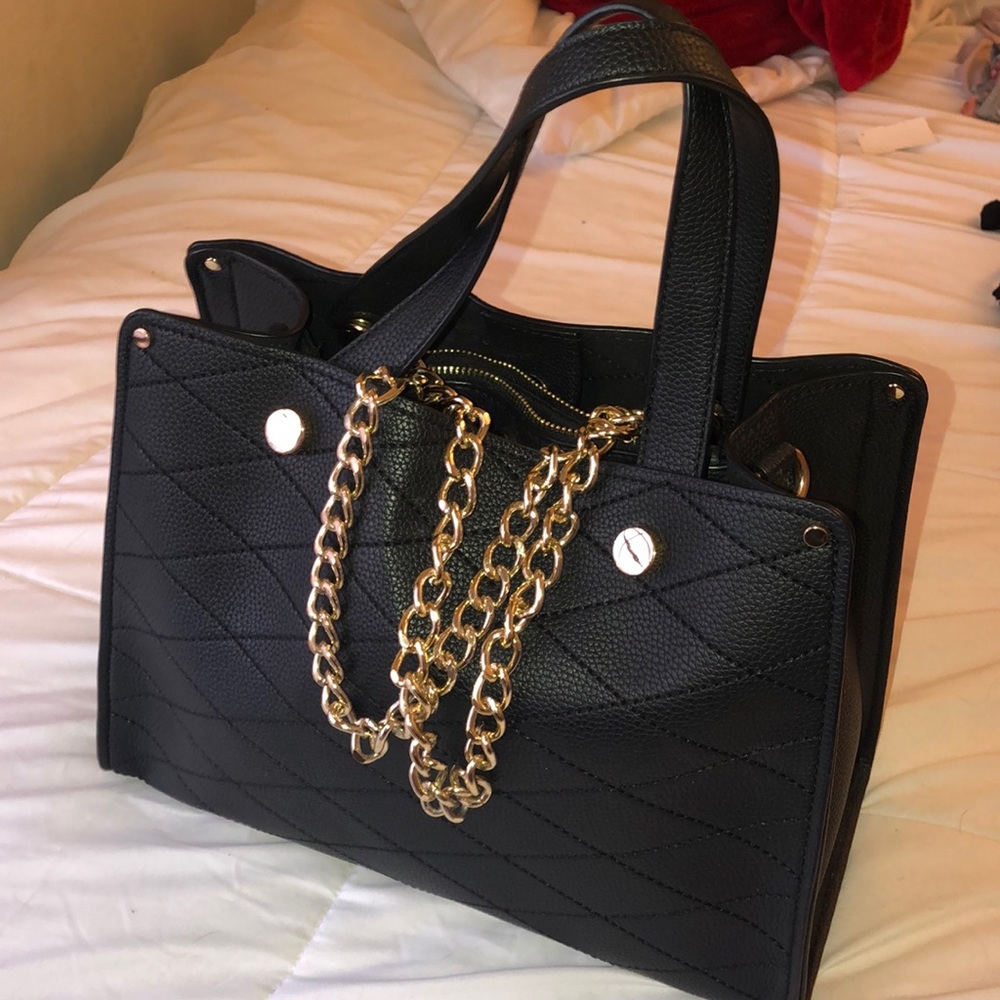 Black and rose gold purse